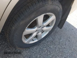 2007 Toyota RAV4 Limited z VIN JTMBD31V076040062, wystawiony jako IAAI lot #42595901 z przebiegiem 220 143 mil mil oraz . Historia ofert i sprzedaży dostępna na DreamBid. Obrazek 12.
