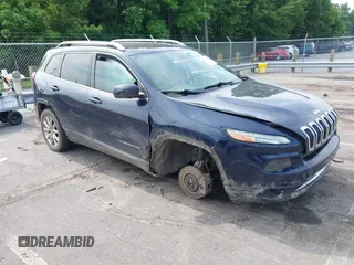 2014 Jeep Cherokee Limited with VIN 1C4PJLDB3EW256212, listed as a IAAI auction lot 42483789 with 235,467 mi miles and . Bid and sale history available at DreamBid. Image 1.