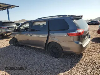 2015 Toyota Sienna LE AAS with VIN 5TDKK3DC1FS561273, listed as a Copart auction lot 52198015 with 220,740 mi miles and Salvage Title. Bid and sale history available at carsss.com. Image 2.