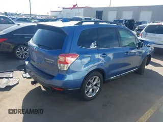 2018 Subaru Forester Touring z VIN JF2SJAWC5JH579570, wystawiony jako IAAI lot #41712344 z przebiegiem 102 251 mil mil oraz . Historia ofert i sprzedaży dostępna na DreamBid. Obrazek 4.