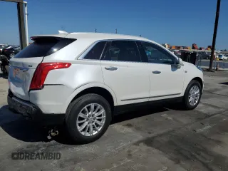 2019 Cadillac XT5 FWD with VIN 1GYKNARS1KZ121732, listed as a Copart auction lot 54882885 with 72,142 mi miles and Salvage title. Bid and sale history available at DreamBid. Image 3.
