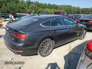 2018 Audi A5 Sportback Prestige with VIN WAUCNCF52JA008984, listed as a Copart auction lot 63944373 with 104,793 mi miles. Bid and sale history available at carsss.com. Image 3.