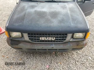 1993 Isuzu Pickup S z VIN 4S1CL11L2P4207469, wystawiony jako Copart lot #79279374 z przebiegiem 144 885 mil mil oraz Tytuł czysty. Historia ofert i sprzedaży dostępna na DreamBid. Obrazek 11.