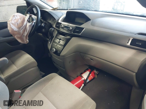 2011 Honda Odyssey LX с VIN 5FNRL5H2XBB075570, выставлен на аукционе IAAI как лот 42168055 с пробегом 169 016 миль миль и . История ставок и продаж доступна на DreamBid. Изображение 5.