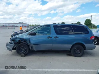 2002 Toyota Sienna LE with VIN 4T3ZF13C62U479542, listed as a IAAI auction lot 42295904 with 199,041 mi miles and . Bid and sale history available at DreamBid. Image 14.