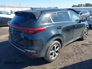 2020 Kia Sportage LX with VIN KNDPM3ACXL7808431, listed as a IAAI auction lot 41614114 with 123,400 mi miles. Bid and sale history available at carsss.com. Image 4.