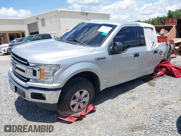 2018 Ford F-150 XL with VIN 1FTEW1EG6JFD14007, listed as a IAAI auction lot 36180966 with 124,521 mi miles and . Bid and sale history available at DreamBid. Image 2.
