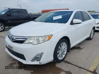 2014 Toyota Camry SE with VIN 4T1BK1FK5EU551196, listed as a IAAI auction lot 41912297 with 104,445 mi miles. Bid and sale history available at carsss.com. Image 18.