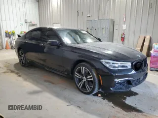 2016 BMW 7 Series 750i with VIN WBA7F0C5XGGL99017, listed as a Copart auction lot 84934504 with 0 mi miles and Salvage Title. Bid and sale history available at carsss.com. Image 4.