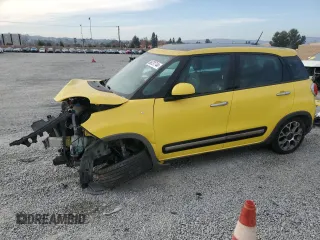 2014 FIAT 500L Trekking with VIN ZFBCFADH4EZ017407, listed as a Copart auction lot 86731744 with 84,989 mi miles and Salvage Title. Bid and sale history available at DreamBid. Image 1.