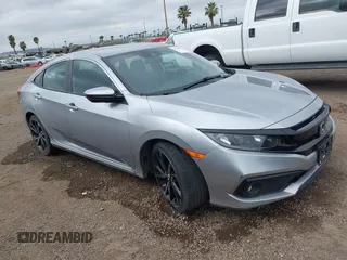 2021 Honda Civic Sport with VIN 2HGFC2F83MH510243, listed as a IAAI auction lot 41856857 with 95,739 mi miles and . Bid and sale history available at DreamBid. Image 1.