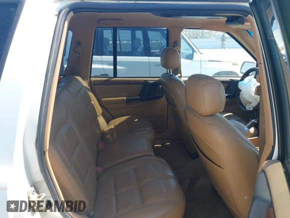 1996 Jeep Grand Cherokee Limited с VIN 1J4GZ78YXTC378363, выставлен на аукционе IAAI как лот 42391787 с пробегом 129 921 миль миль и . История ставок и продаж доступна на DreamBid. Изображение 8.