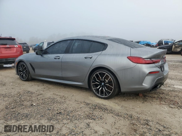 2023 BMW 8 Series M850i z VIN WBAGV8C02PCL20503, wystawiony jako Copart lot #84214214 z przebiegiem Nie podano mil oraz Szkoda całkowita • Salvage title. Historia ofert i sprzedaży dostępna na DreamBid. Obrazek 2.