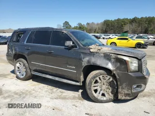 2019 GMC Yukon SLT with VIN 1GKS1BKC1KR117730, listed as a Copart auction lot 49438235 with 147,347 mi miles and Salvage Title. Bid and sale history available at carsss.com. Image 4.