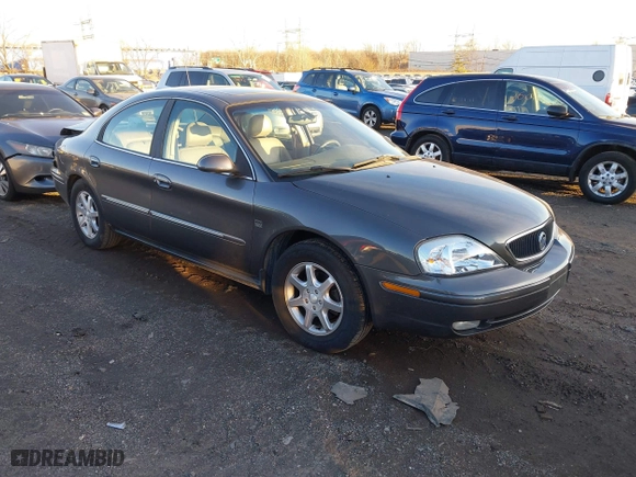 2003 Mercury Sable LS Premium with VIN 1MEFM55S03G606625, listed as a IAAI auction lot 41070883 with 100,002 mi miles. Bid and sale history available at carsss.com. Image 1.