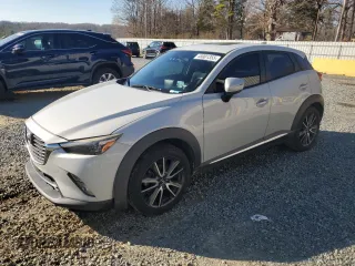 2016 Mazda CX-3 Grand Touring with VIN JM1DKBD70G0106540, listed as a Copart auction lot 45001355 with 233,341 mi miles and Salvage Title. Bid and sale history available at carsss.com. Image 1.