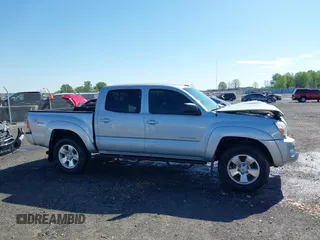 2009 Toyota Tacoma with VIN 3TMLU42N79M034075, listed as a IAAI auction lot 41954016 with 82,399 mi miles and . Bid and sale history available at DreamBid. Image 13.