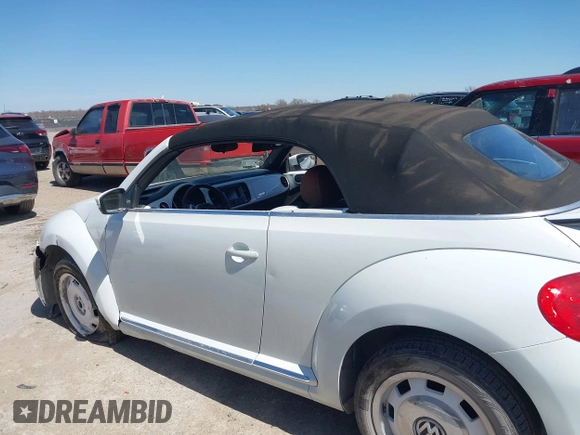 2015 Volkswagen Beetle 1.8T w/Tech with VIN 3VW517AT9FM810122, listed as a IAAI auction lot 41815980 with 72,420 mi miles and . Bid and sale history available at DreamBid. Image 14.