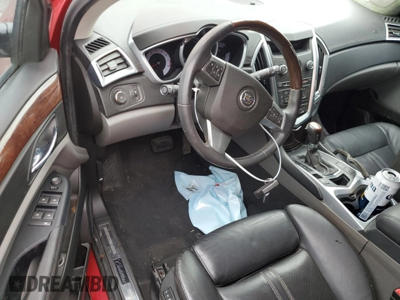 2011 Cadillac SRX Premium Collection with VIN 3GYFNFEY9BS633051, listed as a Copart auction lot 52884075 with 97,997 mi miles and Salvage Title. Bid and sale history available at carsss.com. Image 8.