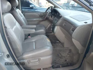 2002 Toyota Sienna LE with VIN 4T3ZF13C72U422993, listed as a IAAI auction lot 41552421 with 260,014 mi miles. Bid and sale history available at carsss.com. Image 5.
