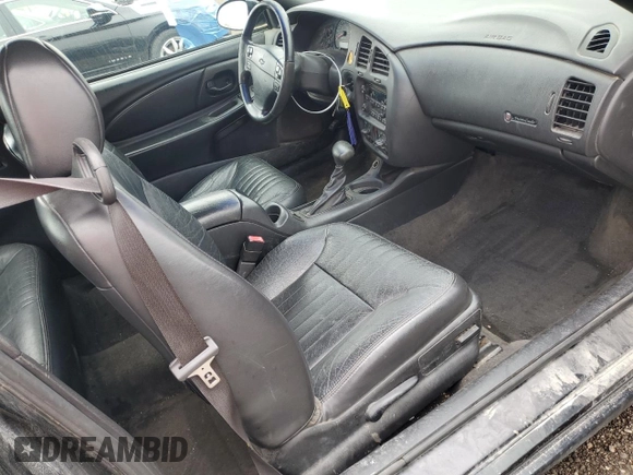 2002 Chevrolet Monte Carlo SS z VIN 2G1WX15K629259244, wystawiony jako Copart lot #54292585 z przebiegiem 239 407 mil mil oraz Szkoda całkowita • Salvage title. Historia ofert i sprzedaży dostępna na DreamBid. Obrazek 8.