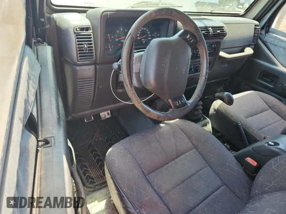 2001 Jeep Wrangler Sport with VIN 1J4FA49S21P374356, listed as a Copart auction lot 63568695 with 202,853 mi miles and Clean title. Bid and sale history available at DreamBid. Image 8.