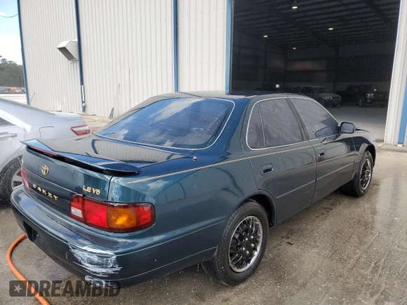 1996 Toyota Camry LE with VIN 4T1BF12K4TU870788, listed as a Copart auction lot 75050564 with 245,619 mi miles and Non repairable. Bid and sale history available at DreamBid. Image 3.