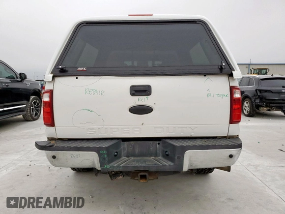 2011 Ford F-250 XL with VIN 1FT7W2BT3BEC24594, listed as a Copart auction lot 59517695 with 289,337 mi miles and Salvage title. Bid and sale history available at DreamBid. Image 6.