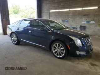 2013 Cadillac XTS Luxury with VIN 2G61P5S31D9140707, listed as a Copart auction lot 59008905 with 93,427 mi miles and Salvage title. Bid and sale history available at DreamBid. Image 4.