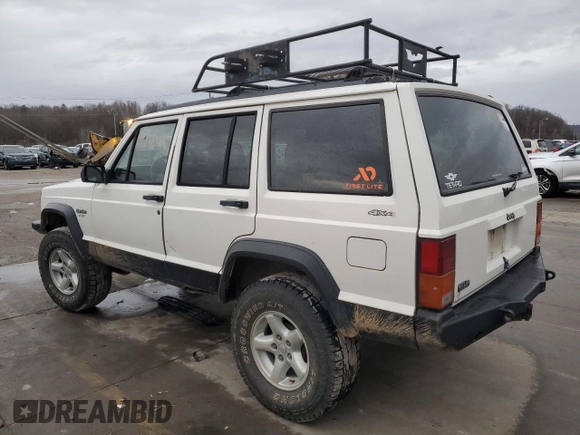 1996 Jeep Cherokee Sport with VIN 1J4FJ68S9TL284984, listed as a Copart auction lot 86307644 with 136,142 mi miles and Salvage Title. Bid and sale history available at carsss.com. Image 2.