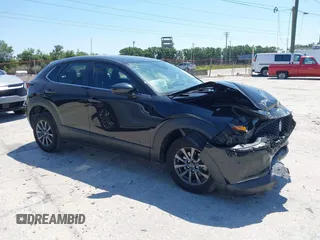 2021 Mazda CX-30 S with VIN 3MVDMAAL7MM268341, listed as a IAAI auction lot 42051154 with 19,539 mi miles and . Bid and sale history available at carsss.com. Image 1.