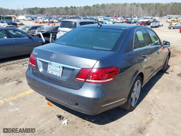 2014 Mercedes-Benz E-Class E 350 Luxury with VIN WDDHF8JB8EA865368, listed as a IAAI auction lot 41790012 with 98,788 mi miles. Bid and sale history available at carsss.com. Image 4.