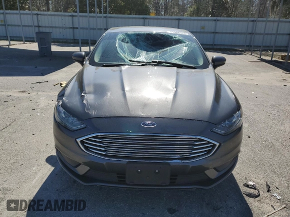 2018 Ford Fusion SE with VIN 3FA6P0HD1JR252599, listed as a Copart auction lot 45666525 with 61,405 mi miles and Salvage Title. Bid and sale history available at DreamBid. Image 5.