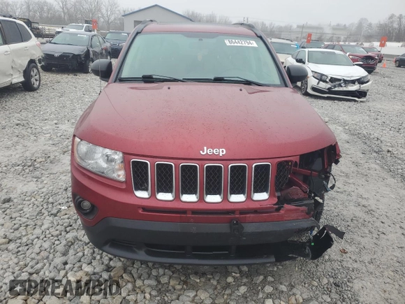 2012 Jeep Compass Latitude with VIN 1C4NJCEAXCD651896, listed as a Copart auction lot 86442794 with 92,181 mi miles and Salvage Title. Bid and sale history available at DreamBid. Image 5.