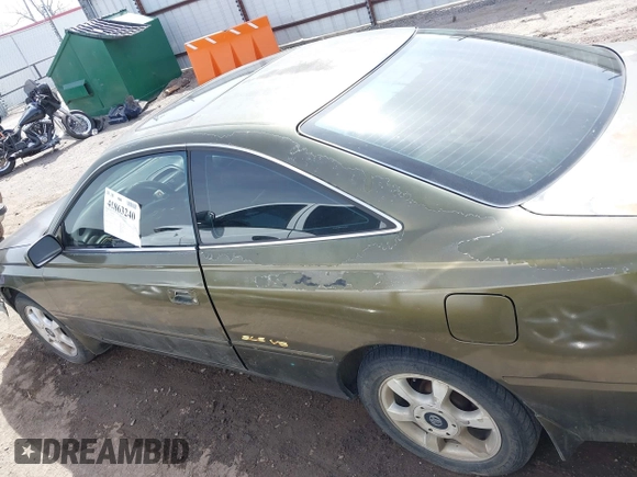 1999 Toyota Solara SE with VIN 2T1CF22PXXC247611, listed as a IAAI auction lot 41863240 with 153,823 mi miles. Bid and sale history available at carsss.com. Image 15.