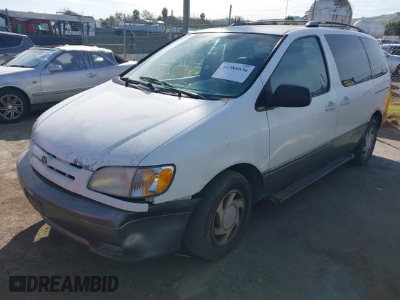 2001 Toyota Sienna LE with VIN 4T3ZF13CX1U327083, listed as a IAAI auction lot 41588036 with 220,064 mi miles. Bid and sale history available at carsss.com. Image 2.