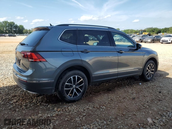 2021 Volkswagen Tiguan SE with VIN 3VV3B7AX6MM078802, listed as a Copart auction lot 61371795 with 69,967 mi miles and Salvage title. Bid and sale history available at DreamBid. Image 3.
