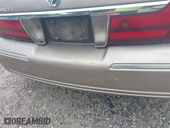 2005 Mercury Grand Marquis LS Premium z VIN 2MEFM75W25X661590, wystawiony jako IAAI lot #42534626 z przebiegiem 113 450 mil mil oraz . Historia ofert i sprzedaży dostępna na DreamBid. Obrazek 14.