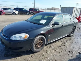 2009 Chevrolet Impala Police Police with VIN 2G1WS57M591282334, listed as a IAAI auction lot 41760445 with 237,338 mi miles. Bid and sale history available at carsss.com. Image 2.