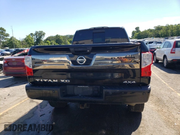 2016 Nissan Titan Pro-4X с VIN 1N6BA1F48GN500861, выставлен на аукционе Copart как лот 46651195 с пробегом 235 134 миль миль и Списание • Salvage title. История ставок и продаж доступна на DreamBid. Изображение 6.