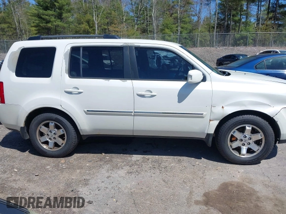 2011 Honda Pilot Touring with VIN 5FNYF4H98BB087713, listed as a IAAI auction lot 42132764 with 250,507 mi miles. Bid and sale history available at carsss.com. Image 14.