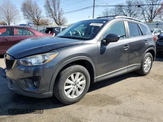 2014 Mazda CX-5 Touring with VIN JM3KE2CY7E0366690, listed as a Copart auction lot 50783635 with 127,853 mi miles and Salvage Title. Bid and sale history available at carsss.com. Image 1.