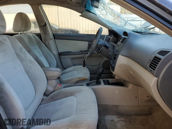 2006 Kia Spectra EX with VIN KNAFE122665277678, listed as a Copart auction lot 74695984 with 205,742 mi miles and Salvage Title. Bid and sale history available at carsss.com. Image 7.