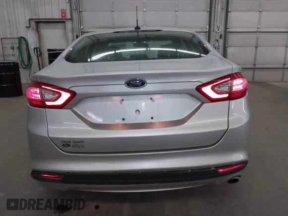2013 Ford Fusion SE Hybrid with VIN 3FA6P0LU7DR228691, listed as a IAAI auction lot 42055540 with 144,389 mi miles and . Bid and sale history available at DreamBid. Image 16.