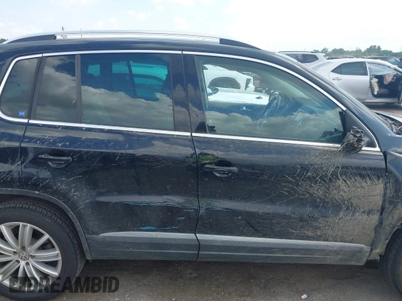 2016 Volkswagen Tiguan R-Line with VIN WVGAV7AX4GW602817, listed as a IAAI auction lot 42460344 with 124,612 mi miles and . Bid and sale history available at DreamBid. Image 13.
