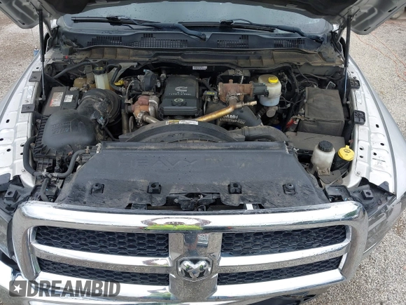 2013 Ram 2500 SLT z VIN 3C6UR5JL9DG571444, wystawiony jako IAAI lot #42210589 z przebiegiem 143 029 mil mil oraz . Historia ofert i sprzedaży dostępna na DreamBid. Obrazek 10.
