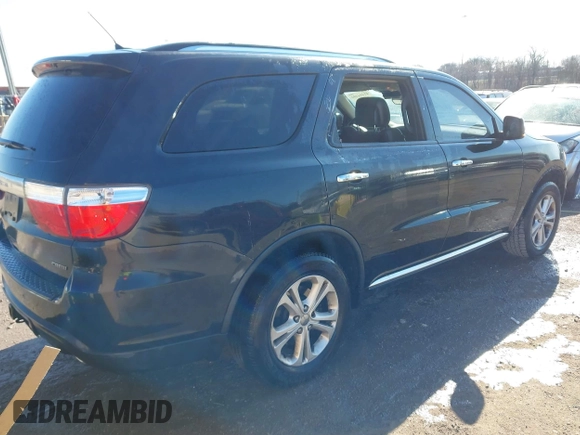 2013 Dodge Durango Crew with VIN 1C4SDHDT3DC553939, listed as a IAAI auction lot 41404491 with 148,505 mi miles and . Bid and sale history available at carsss.com. Image 4.