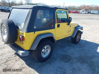 2004 Jeep Wrangler X with VIN 1J4FA39S84P800291, listed as a IAAI auction lot 41975648 with 205,402 mi miles. Bid and sale history available at carsss.com. Image 4.