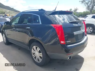2012 Cadillac SRX Luxury Collection with VIN 3GYFNAE38CS635205, listed as a IAAI auction lot 41970482 with 220,593 mi miles and . Bid and sale history available at DreamBid. Image 3.
