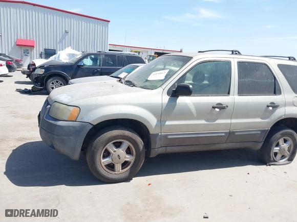 2003 Ford Escape XLS Popular with VIN 1FMYU02103KE20195, listed as a IAAI auction lot 41830663 with 262,580 mi miles. Bid and sale history available at carsss.com. Image 2.